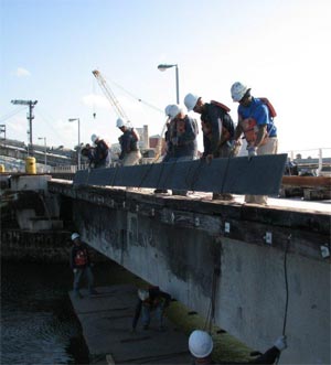 CFRP plate lowering for application